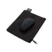 Pebble-shaped black silicone clitoral vibrator resting on a black zippered storage pouch with Fifty Shades of Grey tag.