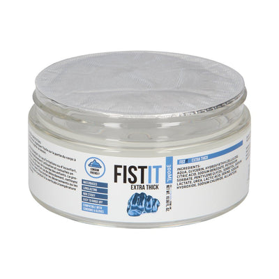 Clear jar of Fist It Extra Thick water-based lubricant with blue and white label, sealed with foil lid.