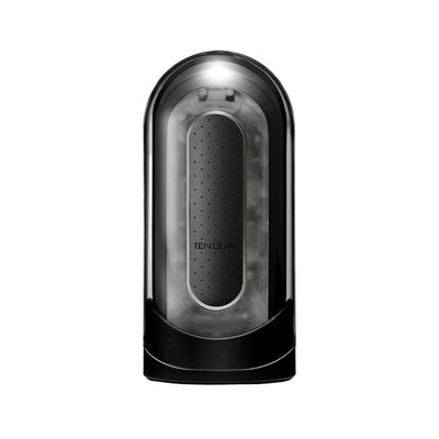 Black Flip Zero Vibration Stroker with sleek ergonomic design and textured grip panel, front view on white background.