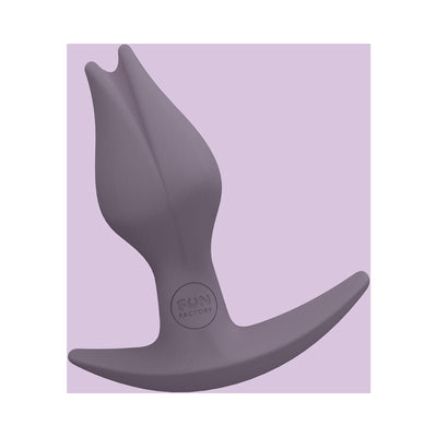 Purple tulip-shaped silicone butt plug with asymmetrical base by Fun Factory on lavender background