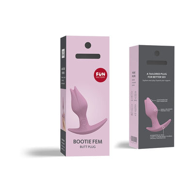 Packaging of Fun Factory Bootie Fem butt plug in soft pink with product image and key features highlighted on the box.