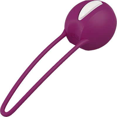 Fun Factory Smartball Uno pelvic floor training ball in white and grape with silicone retrieval loop.