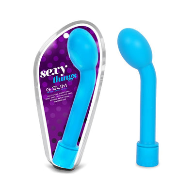 Blue G Slim Petite vibrator with satin finish shown inside and outside purple polka dot packaging.