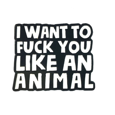 Black and white enamel pin with bold text reading I want to like an animal.