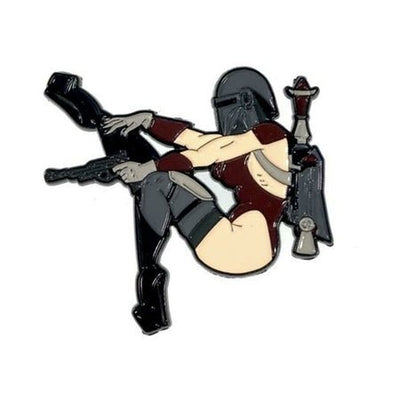 Enamel pin of a stylized female hunter in armor and helmet, sitting with legs raised and holding a blaster gun.