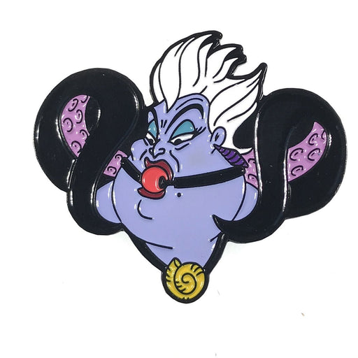Enamel pin featuring a stylized purple sea witch with white hair, tentacles, and a red gag ball.