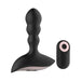 Black silicone anal vibrator with contoured shape and matching remote control with power button.