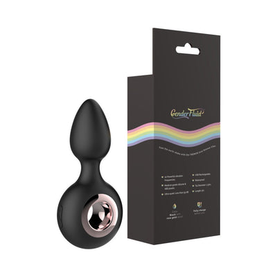 Black silicone anal plug with rose gold ring detail next to Gender Fluid branded packaging with rainbow design.