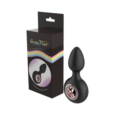 Black silicone anal plug with rose metal ring and sleek ergonomic design next to Gender Fluid branded packaging with rainbow accents.