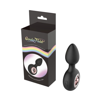 Black silicone Gender Fluid Tremor Ring Plug with rose metal accent and packaging featuring rainbow design.