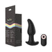 Black silicone Gender Fluid Twirler anal vibrator with curved shape and matching remote control beside packaging box.