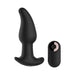 Black silicone gender fluid twirler anal vibrator with ergonomic shape and matching remote control on white background.