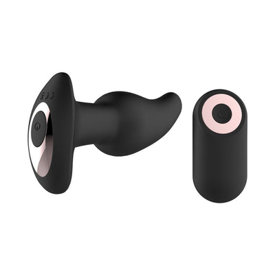 Black silicone anal vibrator with curved tip and matching remote control with pink accent button.