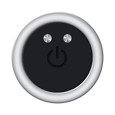 Close-up of the silver metal plug's black silicone base with power button and two control buttons.