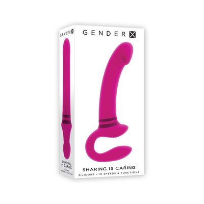 Packaging of Gender X Sharing Is Caring dual-ended rechargeable silicone vibrator in pink with 10 speeds and functions.