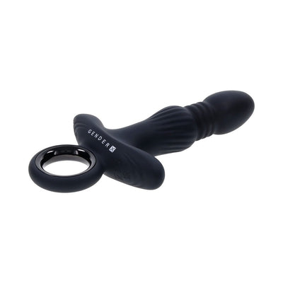 Black silicone Gender X Slayer rechargeable ring thrusting vibrator with textured shaft and ergonomic finger grip.