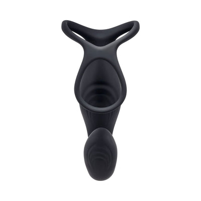 Black rechargeable silicone vibrating C-ring with textured oval shaft and flexible loops, designed for versatile use.