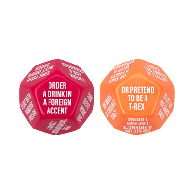 Two large 12-sided dice in red and orange with playful bachelorette party dares printed on each face.