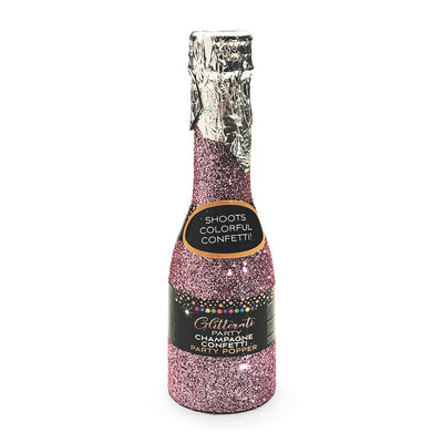 Pink glitter champagne-shaped party popper with silver foil top and label reading shoots colorful confetti.