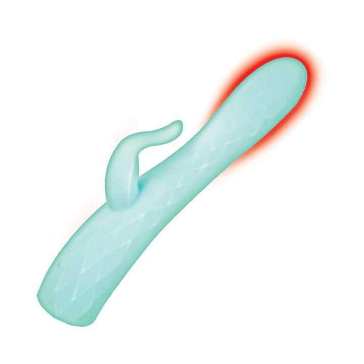 Aqua-colored dual-stimulation massager with textured shaft and warming tip, featuring ergonomic handle and rabbit-style external stimulator.