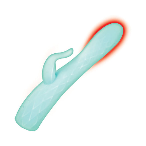 Aqua-colored dual-stimulation massager with textured shaft and warming tip, featuring ergonomic handle and rabbit-style external stimulator.