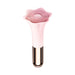 Pink silicone massager shaped like a flower with soft bristles and a metallic rose gold handle.