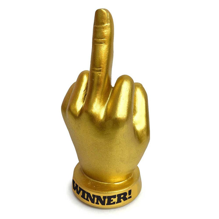 Gold-colored trophy shaped like a hand with middle finger raised, labeled Winner on the base.