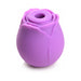 Purple silicone clitoral vibrator shaped like a rosebud with a central suction opening.