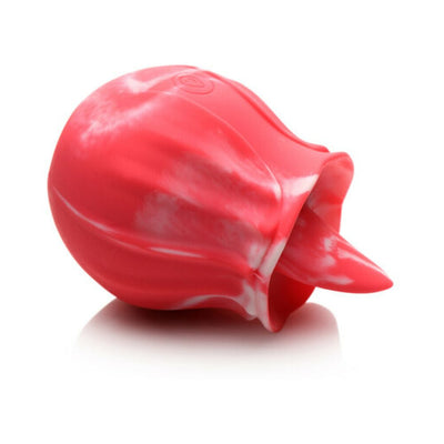 Red and white marbled silicone licking vibrator with a tongue-shaped tip on a white background.