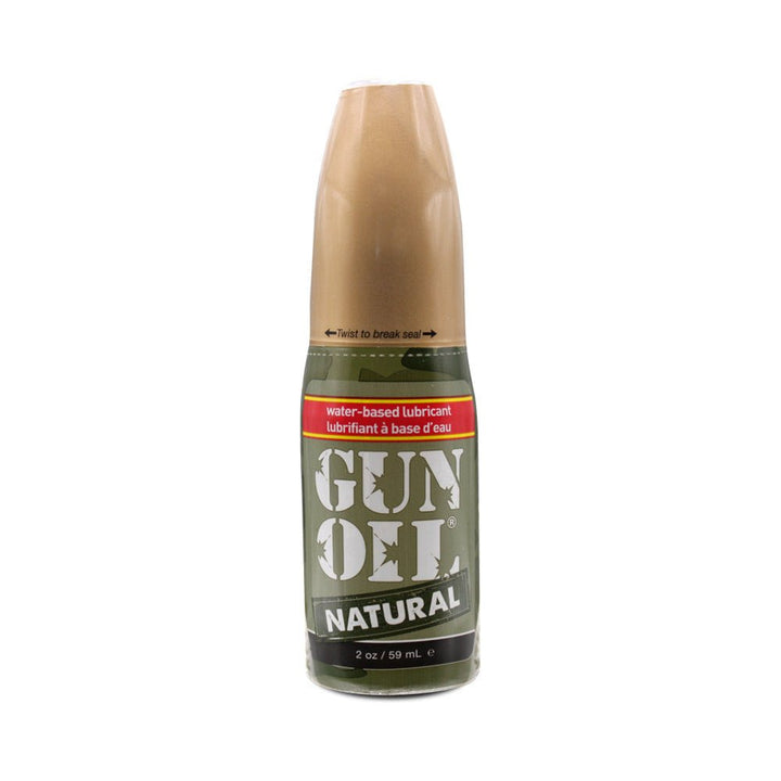 Bottle of Gun Oil Natural water-based lubricant with green and tan label, 2 oz size
