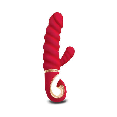 Red Gvibe Gcandy MINI dual motor vibrator with textured shaft and ergonomic gold-accented handle.