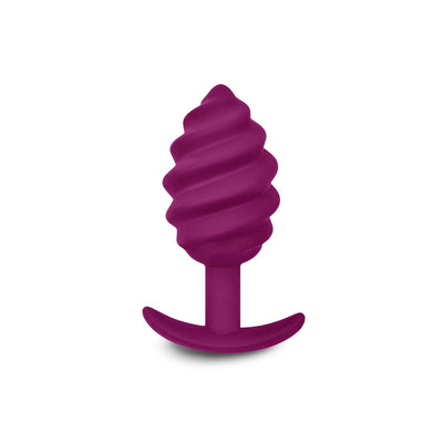 Purple ribbed silicone anal plug with a curved base for comfortable and secure wear.