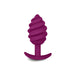 Purple ribbed silicone anal plug with a curved base for comfortable and secure wear.