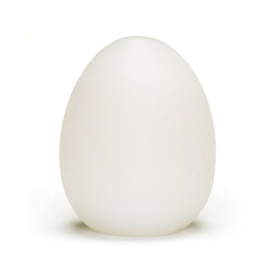 Frosted white egg-shaped reusable pleasure sleeve with smooth, semi-translucent texture.