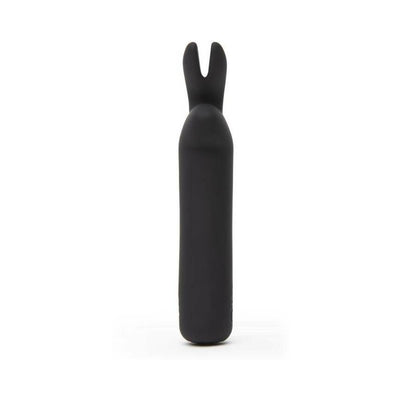 Compact black silicone bullet vibrator with flexible bunny ear tip for targeted stimulation.