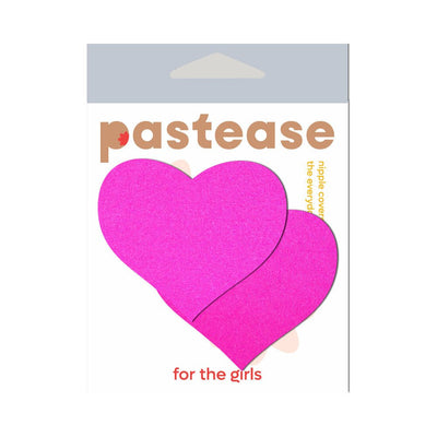 Bright neon pink heart-shaped pasties on white Pastease branded packaging.