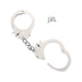 Silver stainless steel handcuffs with chain and two small keys on white background