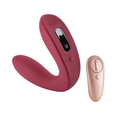 Wine red Hercules C-shape vibrating plug with touch controls and matching rose gold remote control on white background.