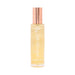 Highonlove Dry Body Oil Spray in clear bottle with rose gold cap, nourishing skin and hair with a lightweight formula.