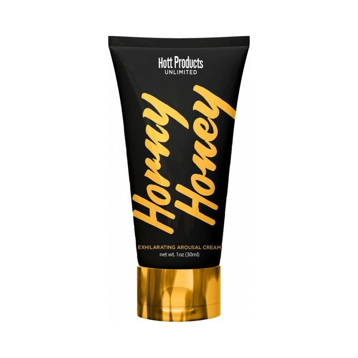 Tube of Horny Honey stimulating arousal cream with black and gold packaging, 1oz size by Hott Products Unlimited.