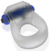Translucent gray stretchy cockring with integrated blue bullet vibrator labeled REVERB, designed for comfortable fit and stimulation.