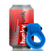 Blue Hunkyjunk Revring cockring with bullet vibrator shown next to a red can for size comparison.
