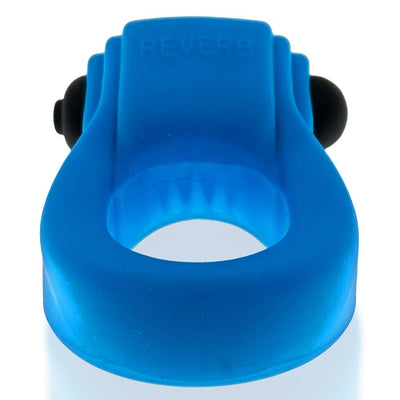 Blue rubbery stretch cockring with integrated black bullet vibrator and embossed REVERB logo on top.