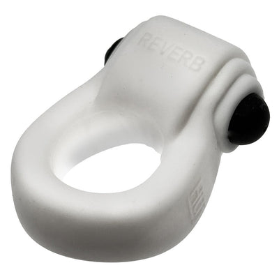 White rubbery stretch cockring with integrated black bullet vibrator and embossed REVERB branding.