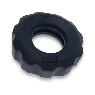 Close-up of a single black textured stretchy ring with a scalloped edge and embossed logo on a white background.