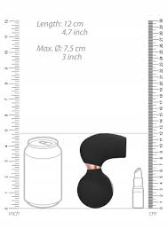 Compact black clitoral vibrator with curved design, shown next to a soda can and lipstick for size comparison.