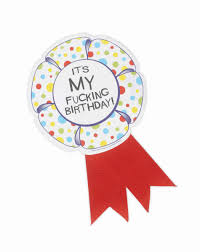 Colorful polka dot birthday award ribbon with bold playful birthday message and red ribbon tails.
