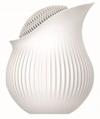 White ergonomic massaging vibrator with textured silicone surface and ribbed body design.