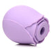 Purple silicone rose-shaped clitoral suction stimulator with a smooth, petal-like design.