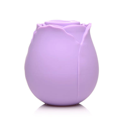 Purple rose-shaped silicone clitoral suction stimulator with smooth petals and compact design.